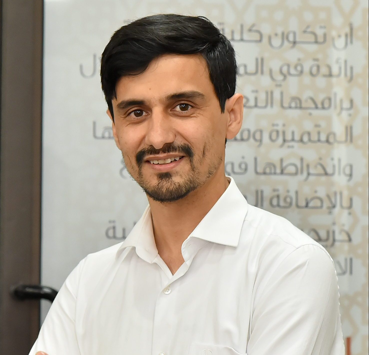 Dr. Qinaat Hussain